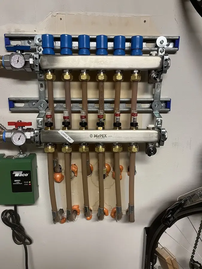 Plumber performing Gas Line Installation at a residential property in Elroy