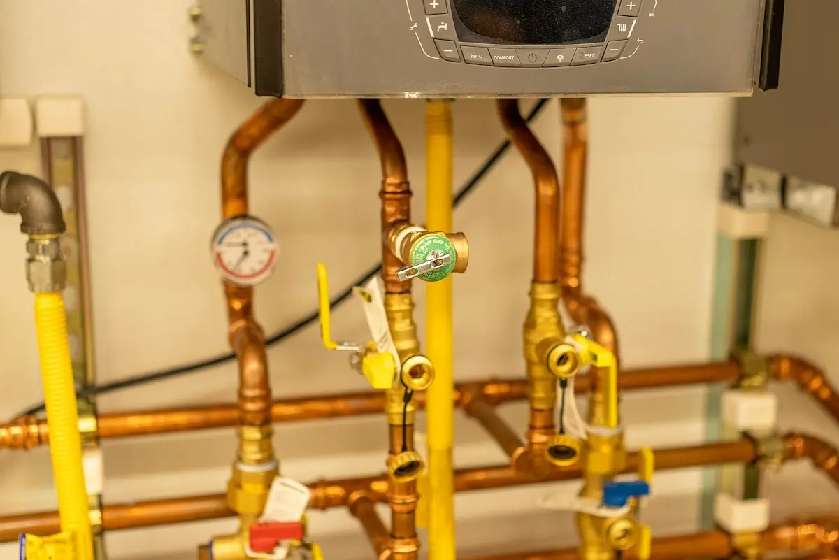 Licensed technician providing Backflow Prevention for a homeowner in Elroy